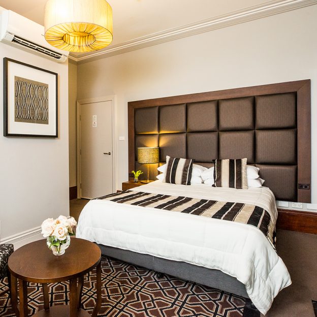 King bed and high-quality furnishings with opulent, expensive touches adorns the king suite at Avonmore on the Park