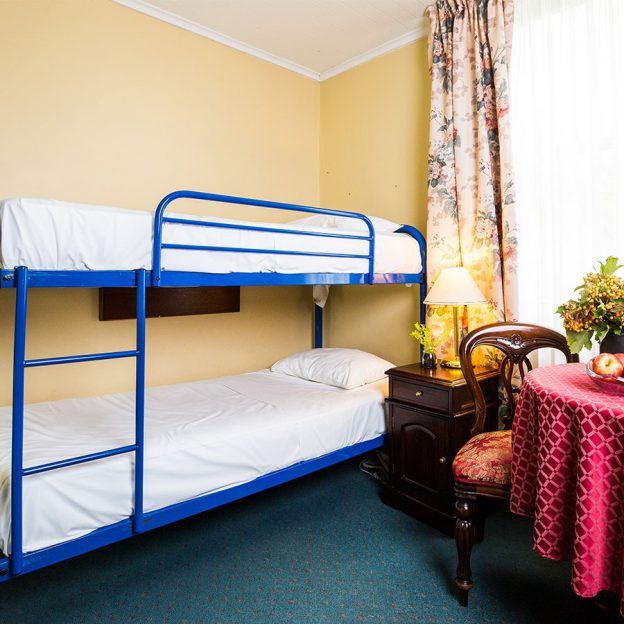 double deck bed with good mattress and high-quality furnishings in Avonmore on the Park boutique hotel Sydney